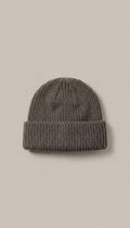 Slate Brown knit cap, Products are shot at a refined 3/4 angle on neutral taupe or ivory matte backgrounds for sculptural...