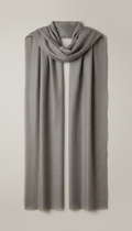 A perfectly centered front view of an Ash Stone shawl, showcasing its minimalist design and elegant texture. The shawl is...