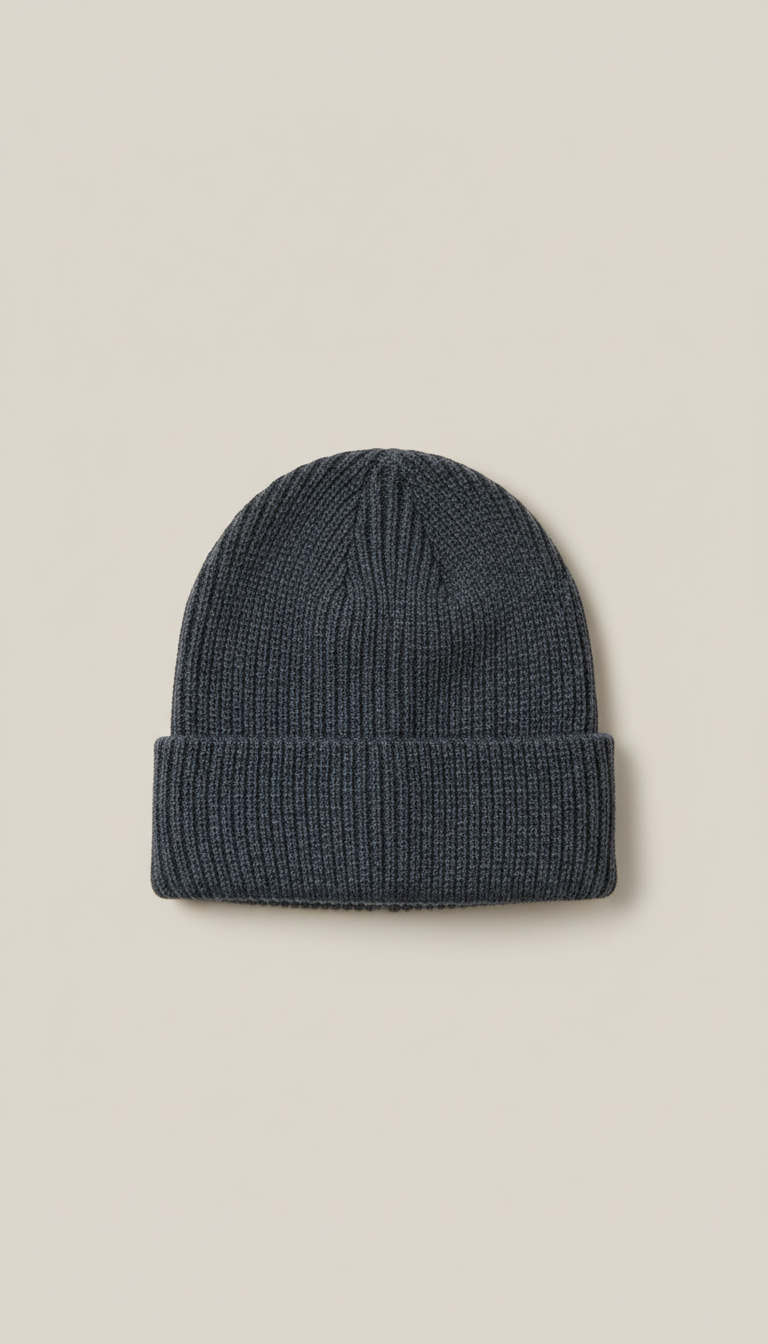 A centered front view of a cotton blend beanie in Dark Slate Gray, set against a neutral, light background. The beanie is...