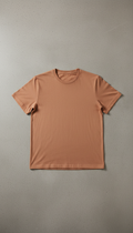 A Terracotta Tan poly-cotton blend shirt, perfectly centered on a neutral Urban Gray background. The shirt is displayed on...